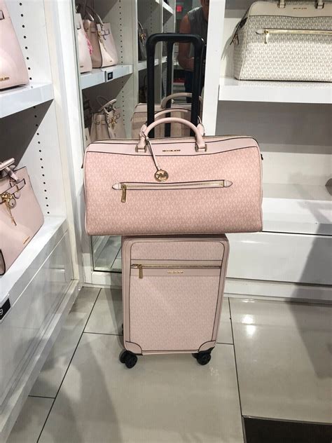 michael kors duffle bag women's|michael kors pink suitcase.